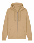 The Stanley/Stella SX712 hoodie is a beige zip-up with a hood and drawstrings. It includes two front pockets and has no visible logos or designs. The hoodie is laid flat against a plain white background.