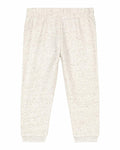 SX767 sweatpants by Stanley/Stella in cream, featuring an elastic waistband and cuffs, displayed against a white background.