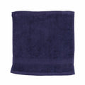 A Towel City TC001 folded navy blue towel featuring a textured border.