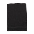 A Towel City TC002 black rectangular towel featuring a textured pattern near one edge.