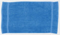 A Towel City TC003, featuring a soft texture and a simple blue design, laid flat against a white background.