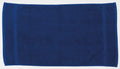 A TC003 towel from Towel City, large and plain, in dark blue, laying flat on a white surface.