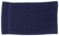 A Towel City TC005 bath towel in navy blue is laid flat on a white background.