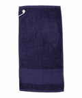 A towel in navy blue, featuring a metal grommet and hook at one corner, from the Towel City brand's TC033 collection.