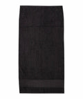 A Towel City TC034 bath towel in plain black, showcased on a white background.