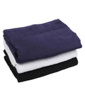 Three printable border bath towels by Towel City stacked on a white background: navy blue on top, white in the middle, and black at the bottom.