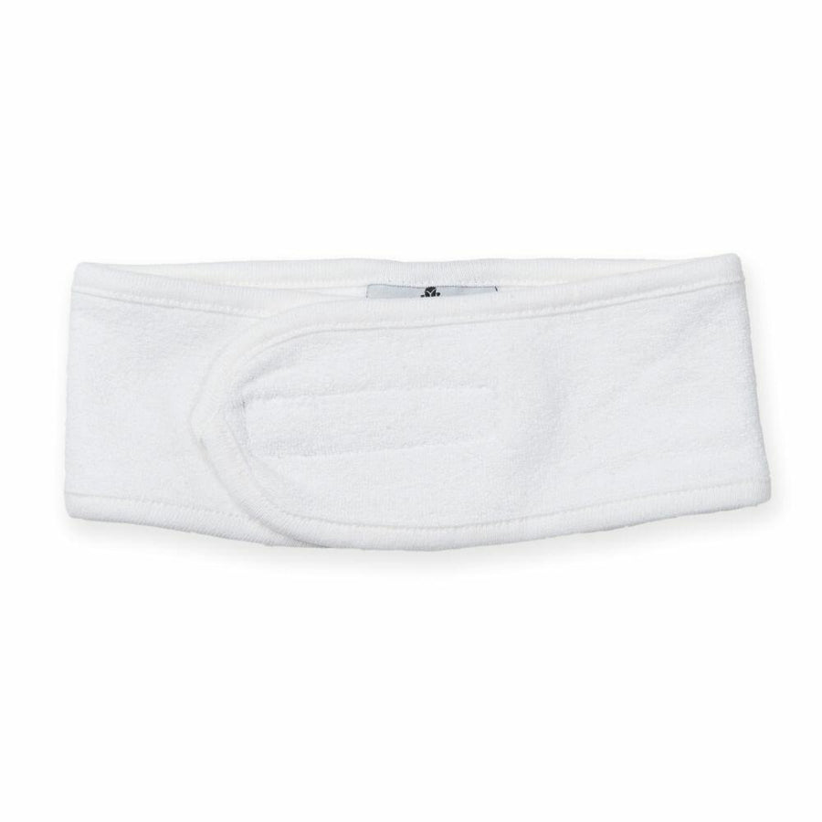 A Towel City TC062, an adjustable headband in white with a Velcro closure, laid flat on a white background.