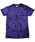 A T-shirt from Colortone, model TD01B, showcases a captivating purple tie-dye design with a central spiral pattern in varying shades from light to dark purple. The shirt is displayed flat on a plain white background.