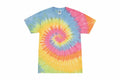 A vibrant and eye-catching TD02M tie-dye t-shirt from Colortone features a spiral pattern in bright shades of blue, yellow, red, and green. The shirt is displayed flat against a white background.