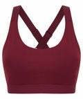 The image features a TL371 sports bra in maroon by Tombo, showcasing its scoop neckline and adjustable crisscross straps against a white backdrop.