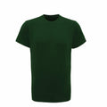 The Tri-Dri TR010 is a plain dark green T-shirt featuring short sleeves and a round neckline, displayed against a white background.