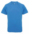 The TR011 by Tri-Dri is a plain blue short-sleeve T-shirt showcased against a white background, featuring a crew neck and straightforward stitching along the sleeves and shoulders.
