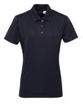 Tri-Dri's TR022 features a black short-sleeve polo shirt with three buttons and a classic collar, showcased against a white background.