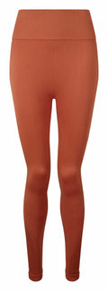 The Tri-Dri TR215 features rust-colored leggings with a high waistband and ribbed detailing on the calves.
