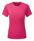 The Tri-Dri TR504 is a vibrant pink short-sleeved t-shirt featuring a crew neckline, showcased on a plain white background. Its smooth fabric and slightly fitted design offer a modern and casual appearance.