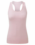 The TR509 from Tri-Dri is a light pink, sleeveless tank top featuring a racerback design. Made from soft and stretchy fabric, it is ideal for both active wear and casual outings. The top embodies simplicity and comfort with its clean look, free of visible logos or patterns.