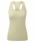 A light beige tank top from Tri-Dri, model TR509, featuring a racerback design and displayed against a white background. The fabric looks lightweight and form-fitting.