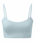 The TR510 by Tri-Dri is a light blue spaghetti strap bralette featuring a seamless design. Its smooth and stretchy material ensures a comfortable fit, while the slightly curved neckline and thin straps contribute to its minimalist aesthetic.