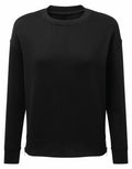 The TR600 by Tri-Dri, is a plain black long-sleeve sweatshirt featuring a crew neckline, shown against a white background.