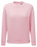 Introducing the TR600 by Tri-Dri: a simple and stylish sweatshirt in a soft, plain light pink color. It features long sleeves and a crew neckline, offering a relaxed fit for everyday comfort. Displayed against a white background, this sweatshirt combines simplicity with ease of wear.