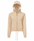 The Tri-Dri TR601 is a beige zip-up hoodie featuring a hood, long sleeves, and a drawstring at the waist. It includes a front pocket and is set against a plain white background.