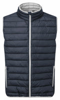 The TS040 by 2786 is a dark gray sleeveless puffer vest designed with a high collar and a white zipper. It features horizontal stitching along with two side zipper pockets.