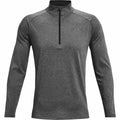 The Under Armour UA004 is a gray, long-sleeve athletic pullover featuring a half-zip and high collar, showcased on a white background.