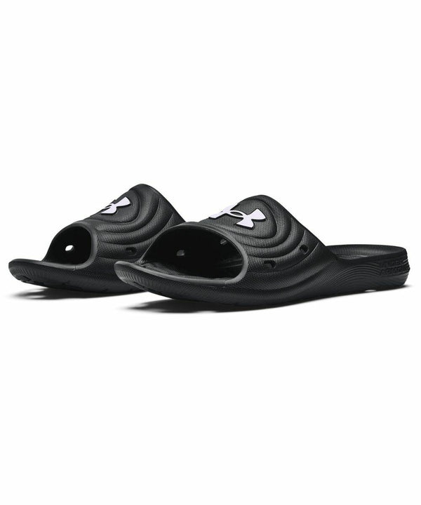 A pair of black open-toe slides with a contoured footbed and the Under Armour logo on the strap, called UA054 by Under Armour.