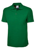 A Uneek UC101 adult unisex classic polo shirt in Kelly Green