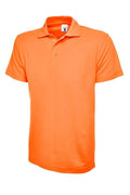 A Uneek UC101 adult unisex classic polo shirt in Orange