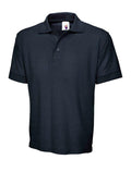 A Uneek UC102 adult unisex heavyweight polo shirt in Navy