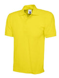 A Uneek UC102 adult unisex heavyweight polo shirt in Yellow