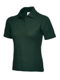 A Uneek UC106 ladies classic polo shirt in Bottle Green