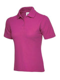 A Uneek UC106 ladies classic polo shirt in Hot Pink