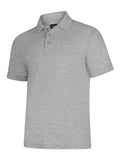 A Uneek UC108 adult unisex deluxe polo shirt in Heather Grey