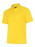A Uneek UC108 adult unisex deluxe polo shirt in Yellow