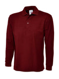 A Uneek UC113 adult unisex long sleeve classic polo shirt in Maroon