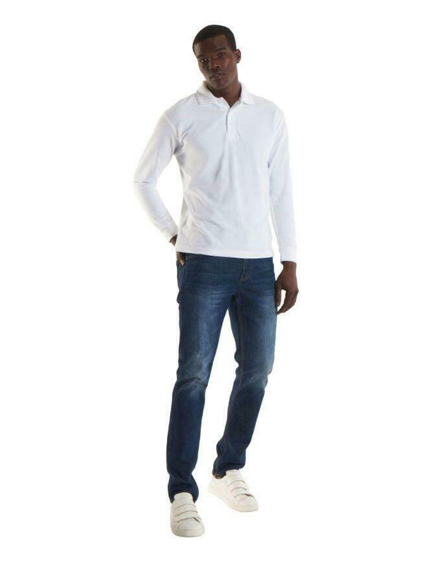 A man wearing a UC113 White Uneek long sleeve pique polo shirt with Blue jeans