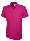 A Uneek UC114 mens unisex active cotton polo shirt in Hot Pink