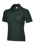 A Uneek UC115 ladies ultra cotton polo shirt in Bottle Green