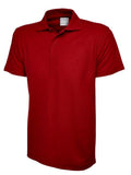 A Uneek UC116 Childrens active cotton polo shirt in Red on a white background