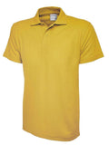 A Uneek UC116 Childrens active cotton polo shirt in Yellow on a white background