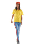 A child wearing a Uneek UC 116 active cooton polo in yellow with Orange beanie and blue trousers walking