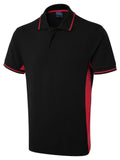 A Black and Red Uneek two tone polo shirt UC117 on a white background