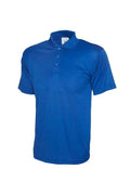A Uneek UC121 childrens unisex active cotton polo shirt in Royal
