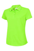 A Uneek UC126 ladies ultra cool polo shirt in Electric Green