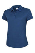 A Uneek UC126 ladies ultra cool polo shirt in Royal
