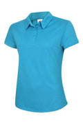 A Uneek UC126 ladies ultra cool polo shirt in Sapphire