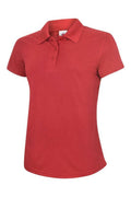 A Uneek UC128 ladies ultra cool workwear polo shirt in Red