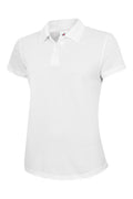 A Uneek UC128 ladies ultra cool workwear polo shirt in White